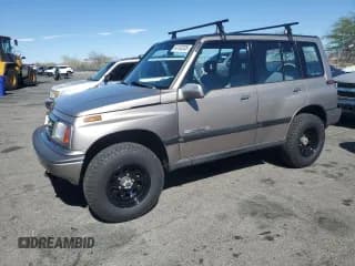 ✅ 1995 Suzuki Sidekick JX • VIN: 2S3TD03V0S6408924 • Lot: 64103335. Wystawiony na Copart z przebiegiem 179 723 mil. Bezpłatny archiwum sprzedaży aukcyjnych z USA i szczegółowy raport historii pojazdu na DreamBid. Zdjęcie 1.