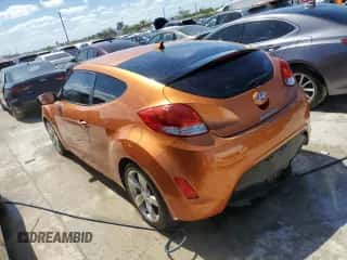 2015 Hyundai Veloster z VIN KMHTC6AD2FU229124, wystawiony jako Copart lot #51488653 z przebiegiem 62 406 mil mil oraz . Historia ofert i sprzedaży dostępna na DreamBid. Obrazek 2.