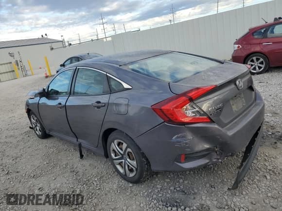 ✅ 2018 Honda Civic LX • VIN: 2HGFC2F58JH594142 • Лот: 85306835. Опубликован ранее на Copart с пробегом 135 010 миль. Бесплатный доступ к архиву аукционных продаж из США и подробный отчёт об истории автомобиля на DreamBid. Изображение 2.