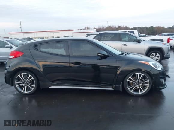 ✅ 2016 Hyundai Veloster Turbo Rally Edition • VIN: KMHTC6AE9GU258145 • Лот: 43753702. Опубликован ранее на IAAI с пробегом 112 828 миль. Бесплатный доступ к архиву аукционных продаж из США и подробный отчёт об истории автомобиля на DreamBid. Изображение 13.