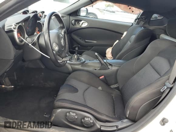 ✅ 2019 Nissan 370Z Nismo • VIN: JN1AZ4EH4KM421718 • Lot: 49014265. Wystawiony na Copart z przebiegiem 28 921 mil. Bezpłatny archiwum sprzedaży aukcyjnych z USA i szczegółowy raport historii pojazdu na DreamBid. Zdjęcie 7.