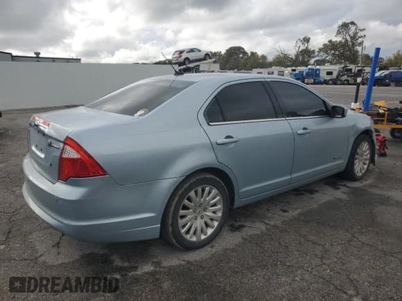 ✅ 2010 Ford Fusion Hybrid • VIN: 3FADP0L30AR137031 • Lot: 90105965. Listed on Copart with 136,040 mi. Free auction sales archive from the USA and detailed vehicle history report at DreamBid. Image 3.