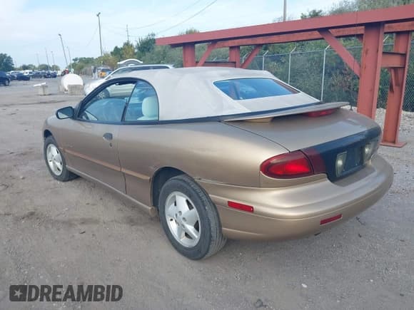 ✅ 1998 Pontiac Sunfire • VIN: 4G2JB32T1WB200294 • Lot: 43243963. Listed on IAAI with 27,829 mi. Free auction sales archive from the USA and detailed vehicle history report at DreamBid. Image 3.