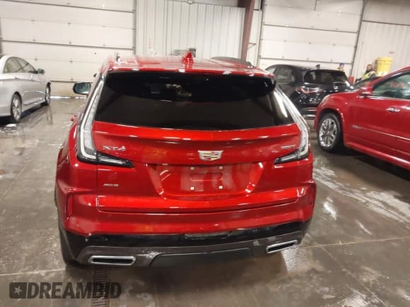 ✅ 2024 Cadillac XT4 AWD Sport • VIN: 1GYFZFR42RF154352 • Лот: 41249916. Опубликован ранее на IAAI с пробегом 27 378 миль. Бесплатный доступ к архиву аукционных продаж из США и подробный отчёт об истории автомобиля на DreamBid. Изображение 16.