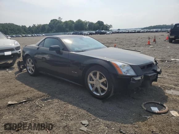 ✅ 2004 Cadillac XLR • VIN: 1G6YV34A245601303 • Lot: 57644265. Wystawiony na Copart z przebiegiem 27 898 mil. Bezpłatny archiwum sprzedaży aukcyjnych z USA i szczegółowy raport historii pojazdu na DreamBid. Zdjęcie 4.
