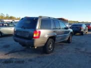 ✅ 2004 Jeep Grand Cherokee Laredo • VIN: 1J4GW48S34C342163 • Lot: 43636001. Listed on IAAI with 306,974 mi. Free auction sales archive from the USA and detailed vehicle history report at DreamBid. Image 4.