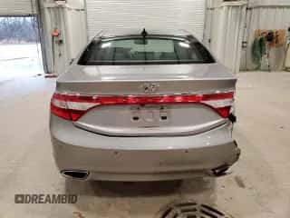 2013 Hyundai Azera z VIN KMHFH4JG7DA329652, wystawiony jako Copart lot #74567364 z przebiegiem 136 578 mil mil oraz Czysty tytuł • Clean title. Historia ofert i sprzedaży dostępna na DreamBid. Obrazek 6.