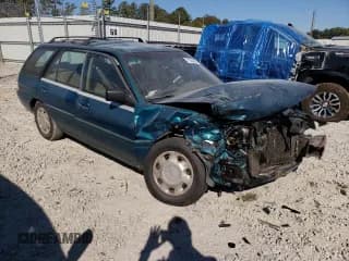 ✅ 1995 Ford Escort LX • VIN: 1FASP15J8SW308311 • Лот: 77624004. Опубликован ранее на Copart с пробегом 345 777 миль. Бесплатный доступ к архиву аукционных продаж из США и подробный отчёт об истории автомобиля на DreamBid. Изображение 4.