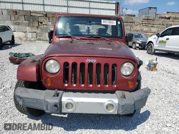 ✅ 2009 Jeep Wrangler Unlimited Sahara • VIN: 1J4GA59149L704745 • Lot: 80519045. Listed on Copart with 152,442 mi. Free auction sales archive from the USA and detailed vehicle history report at DreamBid. Image 5.