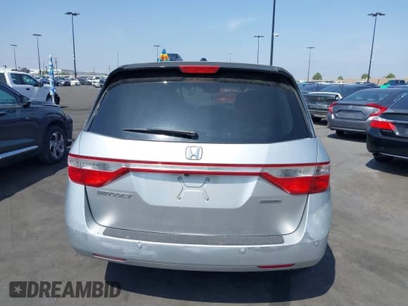 ✅ 2012 Honda Odyssey Touring • VIN: 5FNRL5H91CB004546 • Lot: 42175002. Listed on IAAI with 118,719 mi. Free auction sales archive from the USA and detailed vehicle history report at DreamBid. Image 16.
