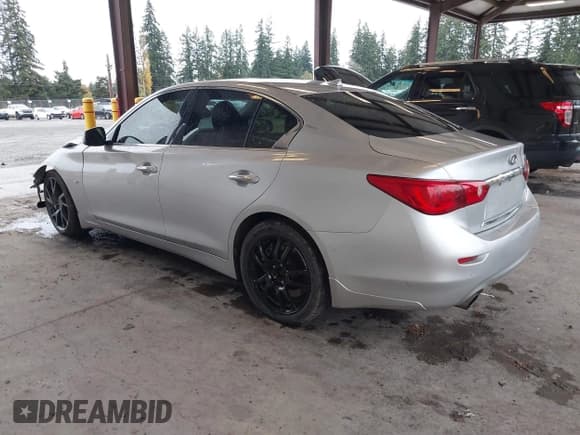 ✅ 2015 Infiniti Q50 Premium • VIN: JN1BV7AP3FM335210 • Lot: 43711853. Listed on IAAI with 102,947 mi. Free auction sales archive from the USA and detailed vehicle history report at DreamBid. Image 3.