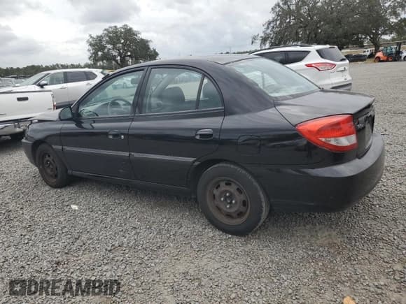 ✅ 2004 Kia Rio • VIN: KNADC125046349408 • Lot: 79868034. Listed on Copart with 97,450 mi. Free auction sales archive from the USA and detailed vehicle history report at DreamBid. Image 2.