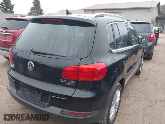 ✅ 2014 Volkswagen Tiguan S • VIN: WVGBV3AX5EW512425 • Lot: 43754178. Listed on IAAI with 157,539 mi. Free auction sales archive from the USA and detailed vehicle history report at DreamBid. Image 4.