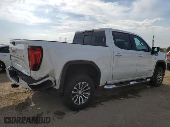 ✅ 2023 GMC Sierra 1500 AT4 • VIN: 1GTUUEE80PZ136104 • Lot: 83977275. Listed on Copart with 32,748 mi. Free auction sales archive from the USA and detailed vehicle history report at DreamBid. Image 3.