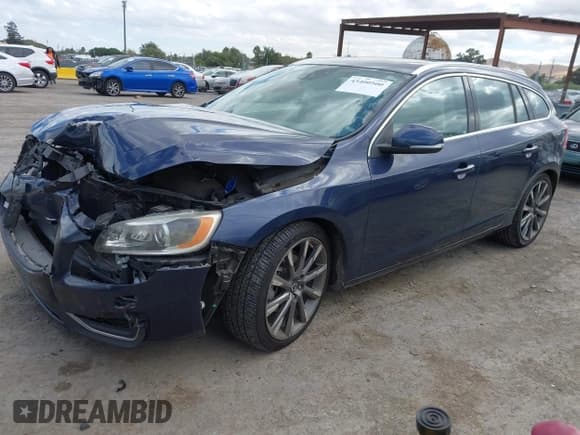 ✅ 2015 Volvo V60 T5 Drive-E Platinum • VIN: YV140MEMXF1219176 • Lot: 43400500. Listed on IAAI with 123,832 mi. Free auction sales archive from the USA and detailed vehicle history report at DreamBid. Image 2.
