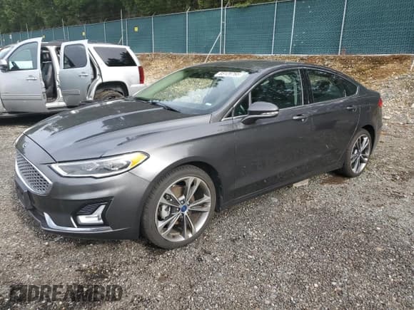 ✅ 2020 Ford Fusion Titanium • VIN: 3FA6P0D93LR130248 • Lot: 85126765. Listed on Copart with 62,546 mi. Free auction sales archive from the USA and detailed vehicle history report at DreamBid. Image 1.