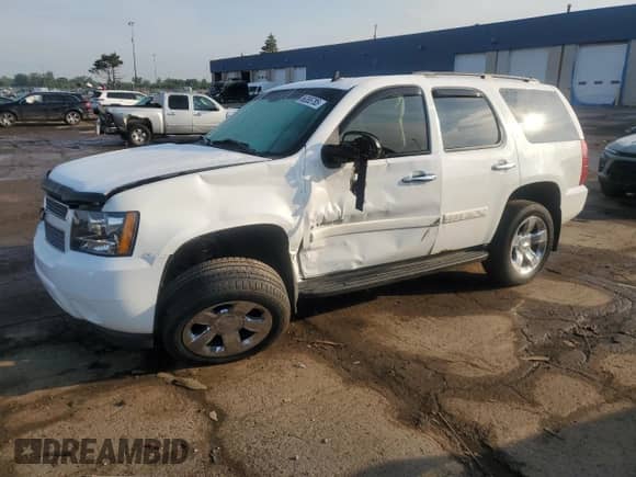2007 Chevrolet Tahoe LTZ z VIN 1GNFK13097J383373, wystawiony jako Copart lot #66365785 z przebiegiem 197 645 mil mil oraz Szkoda całkowita • Salvage title. Historia ofert i sprzedaży dostępna na DreamBid. Obrazek 1.