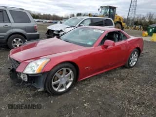 ✅ 2004 Cadillac XLR • VIN: 1G6YV34A845603928 • Lot: 79260073. Wystawiony na Copart z przebiegiem 51 336 mil. Bezpłatny archiwum sprzedaży aukcyjnych z USA i szczegółowy raport historii pojazdu na DreamBid. Zdjęcie 1.