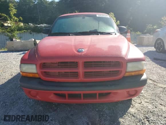 2002 Dodge Dakota Sport z VIN 1B7FL36X72S708969, wystawiony jako Copart lot #69599585 z przebiegiem 77 625 mil mil oraz Szkoda całkowita • Salvage title. Historia ofert i sprzedaży dostępna na DreamBid. Obrazek 5.