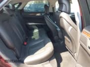 ✅ 2013 Lincoln MKZ Hybrid • VIN: 3LN6L2LU0DR826408 • Lot: 42721880. Wystawiony na IAAI z przebiegiem 169 275 mil. Bezpłatny archiwum sprzedaży aukcyjnych z USA i szczegółowy raport historii pojazdu na DreamBid. Zdjęcie 8.