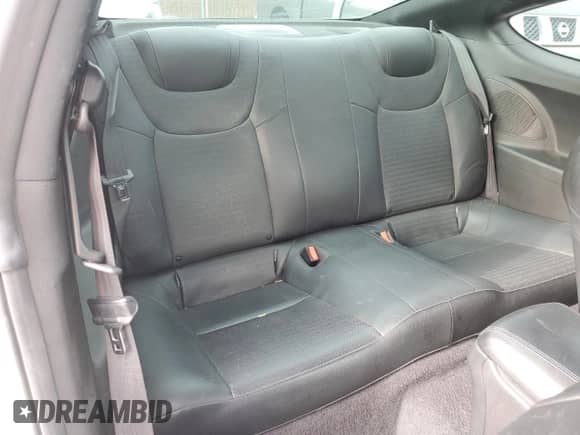 2013 Hyundai Genesis Coupe R-Spec с VIN KMHHU6KJ4DU097746, выставлен на аукционе Copart как лот 81561314 с пробегом 59 842 миль миль и Списание • Salvage title. История ставок и продаж доступна на DreamBid. Изображение 10.