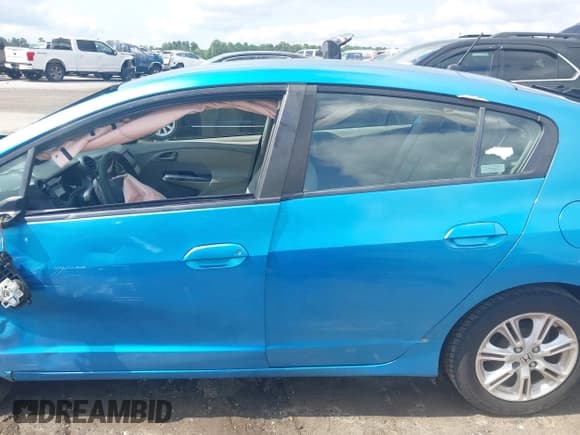 ✅ 2010 Honda Insight EX • VIN: JHMZE2H73AS039062 • Lot: 42443656. Listed on IAAI with 169,471 mi. Free auction sales archive from the USA and detailed vehicle history report at DreamBid. Image 15.