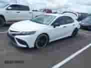 2022 Toyota Camry SE z VIN 4T1T11AK3NU066747, wystawiony jako IAAI lot #42347249 z przebiegiem 112 765 mil mil oraz . Historia ofert i sprzedaży dostępna na DreamBid. Obrazek 17.