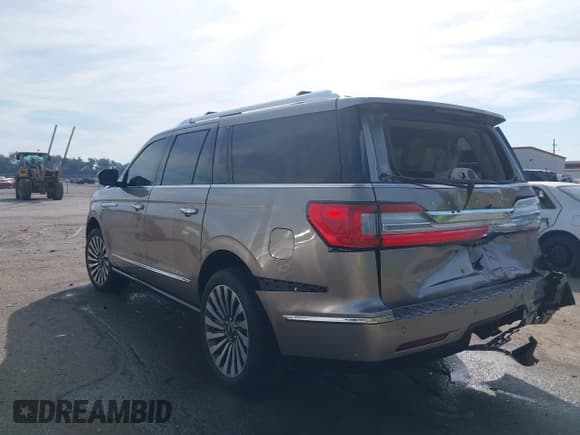✅ 2019 Lincoln Navigator Reserve • VIN: 5LMJJ3LT4KEL22261 • Лот: 43293071. Опубликован ранее на IAAI с пробегом 99 006 миль. Бесплатный доступ к архиву аукционных продаж из США и подробный отчёт об истории автомобиля на DreamBid. Изображение 3.
