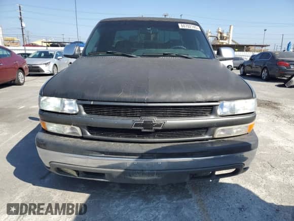 2001 Chevrolet Silverado 1500 LT z VIN 1GCEC19T01Z169707, wystawiony jako Copart lot #60702145 z przebiegiem 331 582 mil mil oraz Czysty tytuł • Clean title. Historia ofert i sprzedaży dostępna na DreamBid. Obrazek 5.