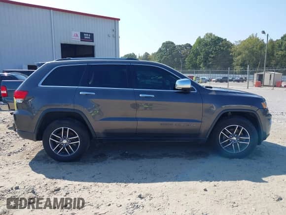 2018 Jeep Grand Cherokee Limited z VIN 1C4RJEBGXJC131268, wystawiony jako IAAI lot #43145810 z przebiegiem 163 332 mil mil oraz . Historia ofert i sprzedaży dostępna na DreamBid. Obrazek 13.