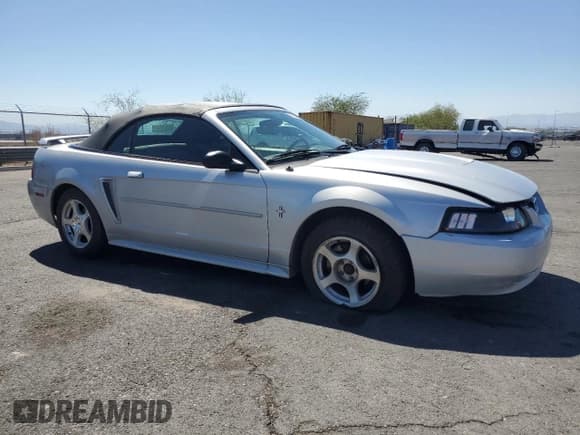 ✅ 2003 Ford Mustang Deluxe • VIN: 1FAFP44423F391427 • Lot: 80658235. Listed on Copart with 85,774 mi. Free auction sales archive from the USA and detailed vehicle history report at DreamBid. Image 4.