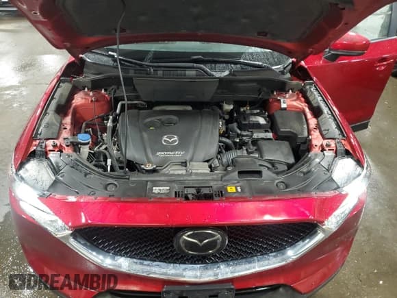 ✅ 2018 Mazda CX-5 Touring • VIN: JM3KFBCM5J0462676 • Lot: 57892015. Listed on Copart with 76,566 mi. Free auction sales archive from the USA and detailed vehicle history report at DreamBid. Image 12.