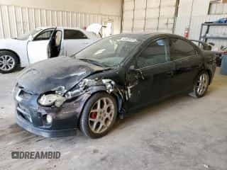 2005 Dodge Neon SRT-4 z VIN 1B3ES66S85D176114, wystawiony jako Copart lot #62903625 z przebiegiem 114 449 mil mil oraz Szkoda całkowita • Salvage title. Historia ofert i sprzedaży dostępna na DreamBid. Obrazek 1.