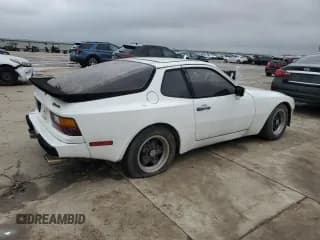 ✅ 1984 Porsche 944 • VIN: WP0AA094XEN452894 • Лот: 49852435. Опубликован ранее на Copart с пробегом 37 161 миль. Бесплатный доступ к архиву аукционных продаж из США и подробный отчёт об истории автомобиля на DreamBid. Изображение 3.
