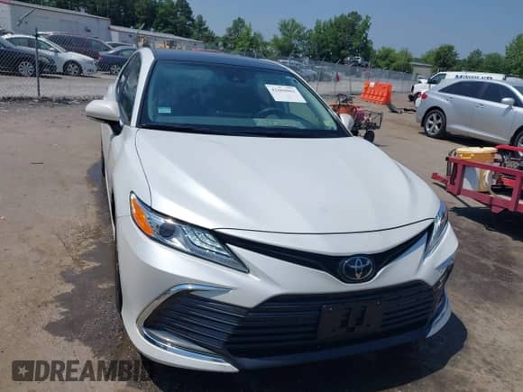 2022 Toyota Camry XLE with VIN 4T1F11AK2NU710770, listed as a IAAI auction lot 42604063 with 5,840 mi miles and . Bid and sale history available at DreamBid. Image 12.