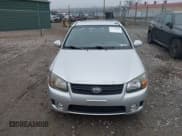 ✅ 2009 Kia Spectra EX • VIN: KNAFE222095027380 • Lot: 43730880. Listed on IAAI with 200,112 mi. Free auction sales archive from the USA and detailed vehicle history report at DreamBid. Image 12.