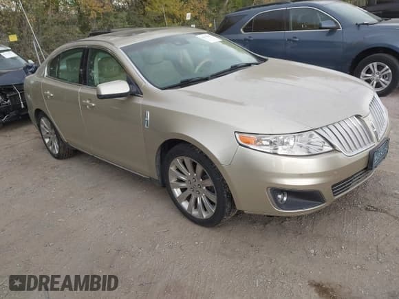 ✅ 2010 Lincoln MKS • VIN: 1LNHL9DR6AG610772 • Lot: 43613487. Wystawiony na IAAI z przebiegiem 210 908 mil. Bezpłatny archiwum sprzedaży aukcyjnych z USA i szczegółowy raport historii pojazdu na DreamBid. Zdjęcie 1.