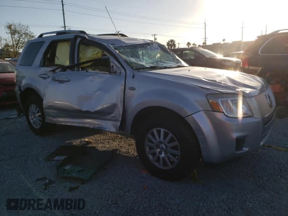 ✅ 2009 Mercury Mariner Premier • VIN: 4M2CU87789KJ23933 • Lot: 45120455. Listed on Copart with 104,465 mi. Free auction sales archive from the USA and detailed vehicle history report at DreamBid. Image 4.