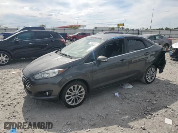 ✅ 2018 Ford Fiesta Titanium • VIN: 3FADP4CJ1JM109757 • Lot: 70323385. Listed on Copart with 40,404 mi. Free auction sales archive from the USA and detailed vehicle history report at DreamBid. Image 1.