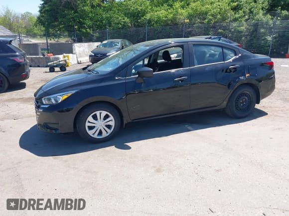 ✅ 2023 Nissan Versa S • VIN: 3N1CN8DV4PL831133 • Lot: 42136974. Listed on IAAI with 50,460 mi. Free auction sales archive from the USA and detailed vehicle history report at DreamBid. Image 18.