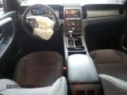 ✅ 2014 Ford Taurus SEL • VIN: 1FAHP2H89EG142226 • Lot: 60197215. Wystawiony na Copart z przebiegiem 104 687 mil. Bezpłatny archiwum sprzedaży aukcyjnych z USA i szczegółowy raport historii pojazdu na DreamBid. Zdjęcie 8.