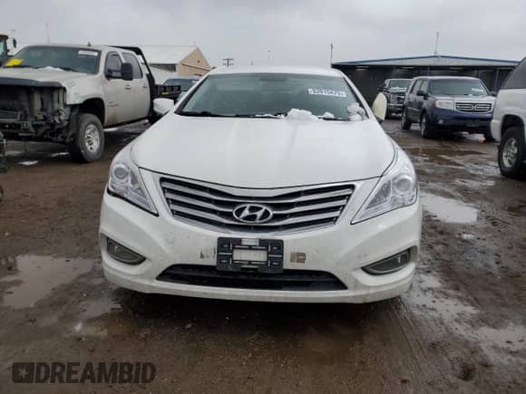2013 Hyundai Azera z VIN KMHFG4JG0DA224230, wystawiony jako Copart lot #53915475 z przebiegiem 143 788 mil mil oraz Czysty tytuł • Clean title. Historia ofert i sprzedaży dostępna na DreamBid. Obrazek 5.
