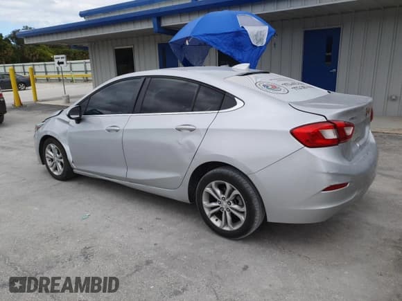 ✅ 2019 Chevrolet Cruze LT • VIN: 1G1BE5SM5K7144895 • Lot: 90997745. Listed on Copart with 208,245 mi. Free auction sales archive from the USA and detailed vehicle history report at DreamBid. Image 2.