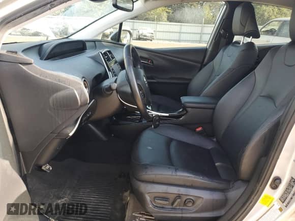 2021 Toyota Prius L Eco с VIN JTDKAMFU1M3138206, выставлен на аукционе Copart как лот 80360175 с пробегом 67 910 миль миль и Списание • Salvage title. История ставок и продаж доступна на DreamBid. Изображение 7.