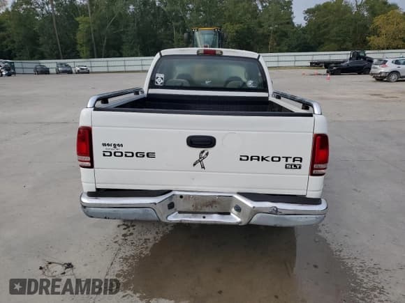 ✅ 2004 Dodge Dakota SLT • VIN: 1D7HG48N74S762117 • Lot: 85271725. Listed on Copart with Not provided. Free auction sales archive from the USA and detailed vehicle history report at DreamBid. Image 6.