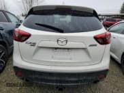 ✅ 2016 Mazda CX-5 Grand Touring • VIN: JM3KE4DY1G0803211 • Лот: 89537495. Опубликован ранее на Copart с пробегом 255 646 миль. Бесплатный доступ к архиву аукционных продаж из США и подробный отчёт об истории автомобиля на DreamBid. Изображение 6.