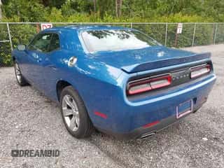 2021 Dodge Challenger SXT z VIN 2C3CDZAG2MH520899, wystawiony jako IAAI lot #43249657 z przebiegiem 64 330 mil mil oraz . Historia ofert i sprzedaży dostępna na DreamBid. Obrazek 3.