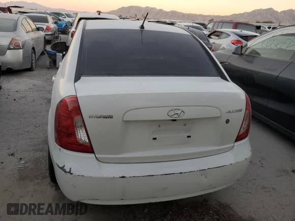 2007 Hyundai Accent GLS z VIN KMHCN46C07U097190, wystawiony jako Copart lot #83273024 z przebiegiem 156 340 mil mil oraz Nie do naprawy • Non repairable. Historia ofert i sprzedaży dostępna na DreamBid. Obrazek 6.
