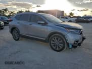 ✅ 2020 Honda CR-V Touring • VIN: 7FARW1H92LE017925 • Lot: 93729505. Listed on Copart with 58,772 mi. Free auction sales archive from the USA and detailed vehicle history report at DreamBid. Image 4.