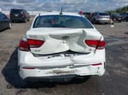 ✅ 2021 Kia Rio S • VIN: 3KPA24ADXME364463 • Лот: 43307377. Опубликован ранее на IAAI с пробегом 79 537 миль. Бесплатный доступ к архиву аукционных продаж из США и подробный отчёт об истории автомобиля на DreamBid. Изображение 6.